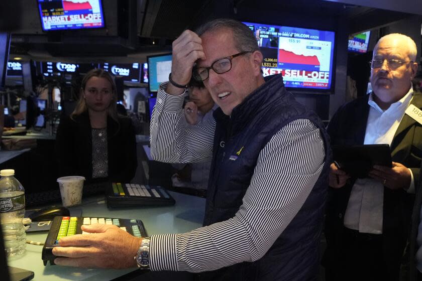 Expert Glenn Carell works his post on the floor of the New York Stock Exchange on Monday, Aug. 5, 2024. Almost everything on Wall Street is down as fears of a slowdown in the U.S. economy worsen, sparking another sell-off in financial markets around the world. (AP Photo/Richard Drew)